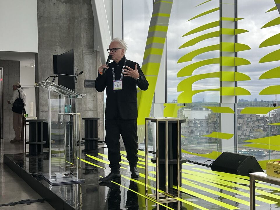 Andrew King speaking at the C2 Montreal conference